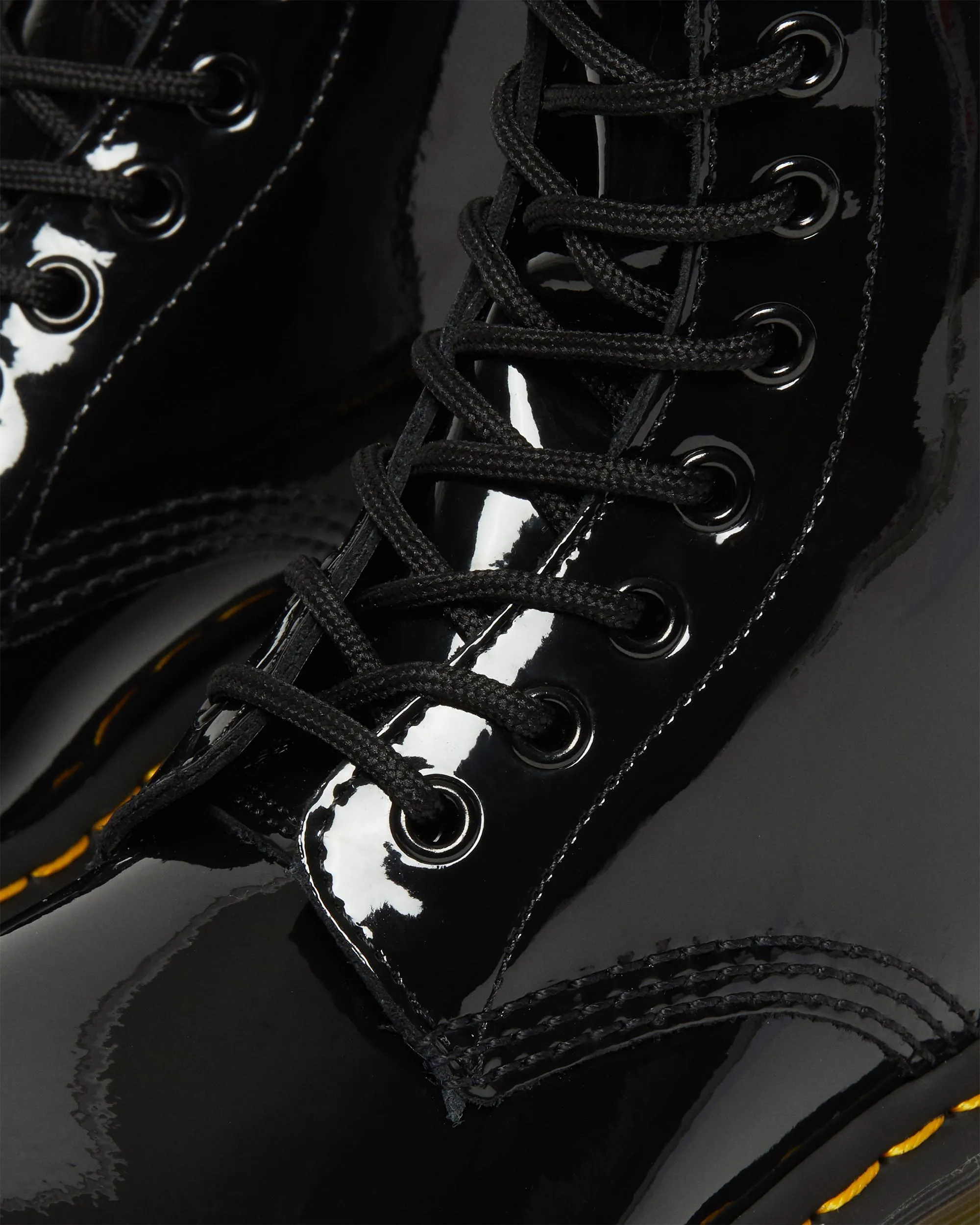 1460 Women's patent leather lace-up boots Dr. Martens